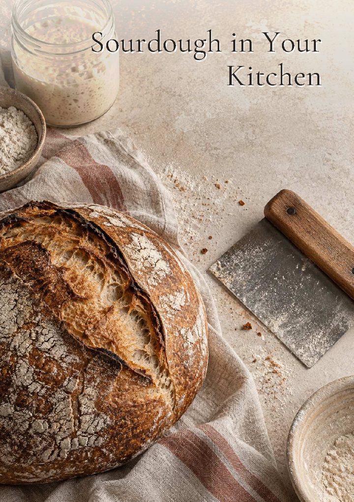 Cover of Sourdough in Your Kitchen, showing a sourdough loaf, a jar of starter and a bench scraper on a linen cloth